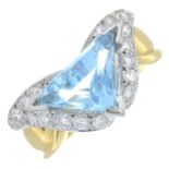 An 18ct gold brilliant-cut diamond and aquamarine dress ring.Aquamarine calculated weight 2.46cts,