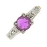 A pink tourmaline and rose-cut diamond ring.Tourmaline weight 0.50ct,