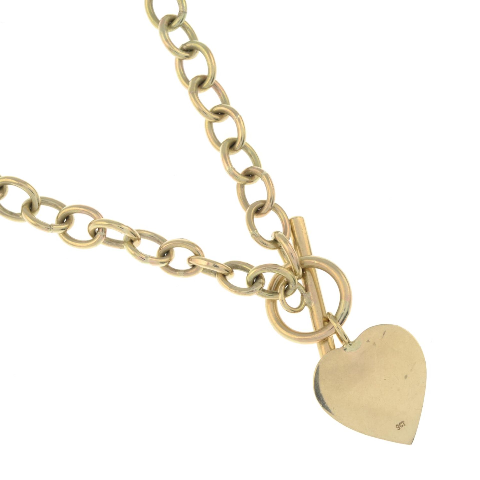 A trace-link necklace, with T-bar clasp, suspending a heart-shape pendant. - Image 3 of 3