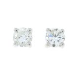 A pair of brilliant-cut diamond single-stone earrings,