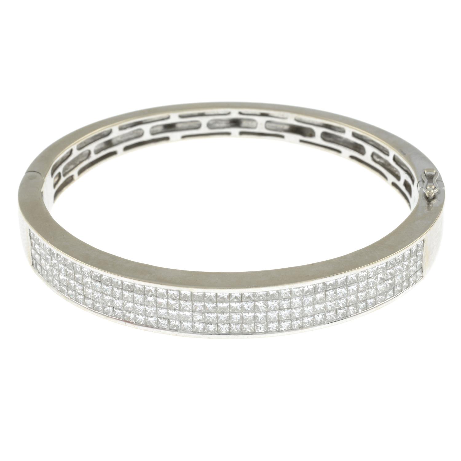 An 18ct gold square-shape diamond bangle,