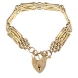 A gate bracelet, with heart-shape padlock clasp.