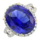 An 18ct gold tanzanite and brilliant-cut diamond dress ring.Tanzanite weight 11.45cts.Diamond