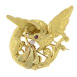 A winged serpent brooch,