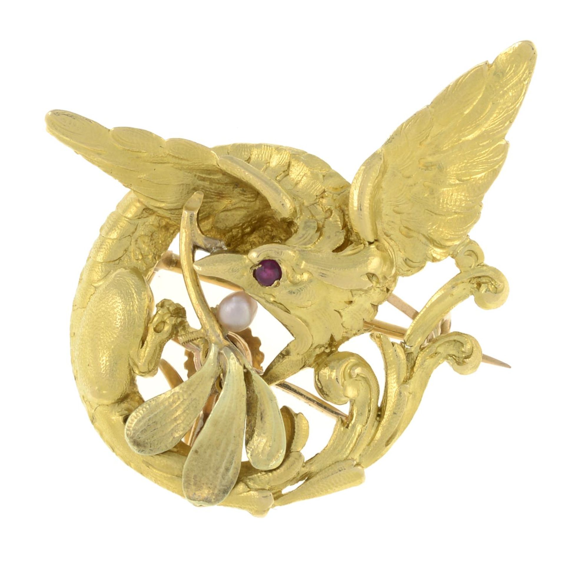 A winged serpent brooch,