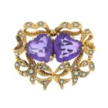 A 9ct gold amethyst and seed pearl brooch.Hallmarks for London, 1974.Length 3cms.