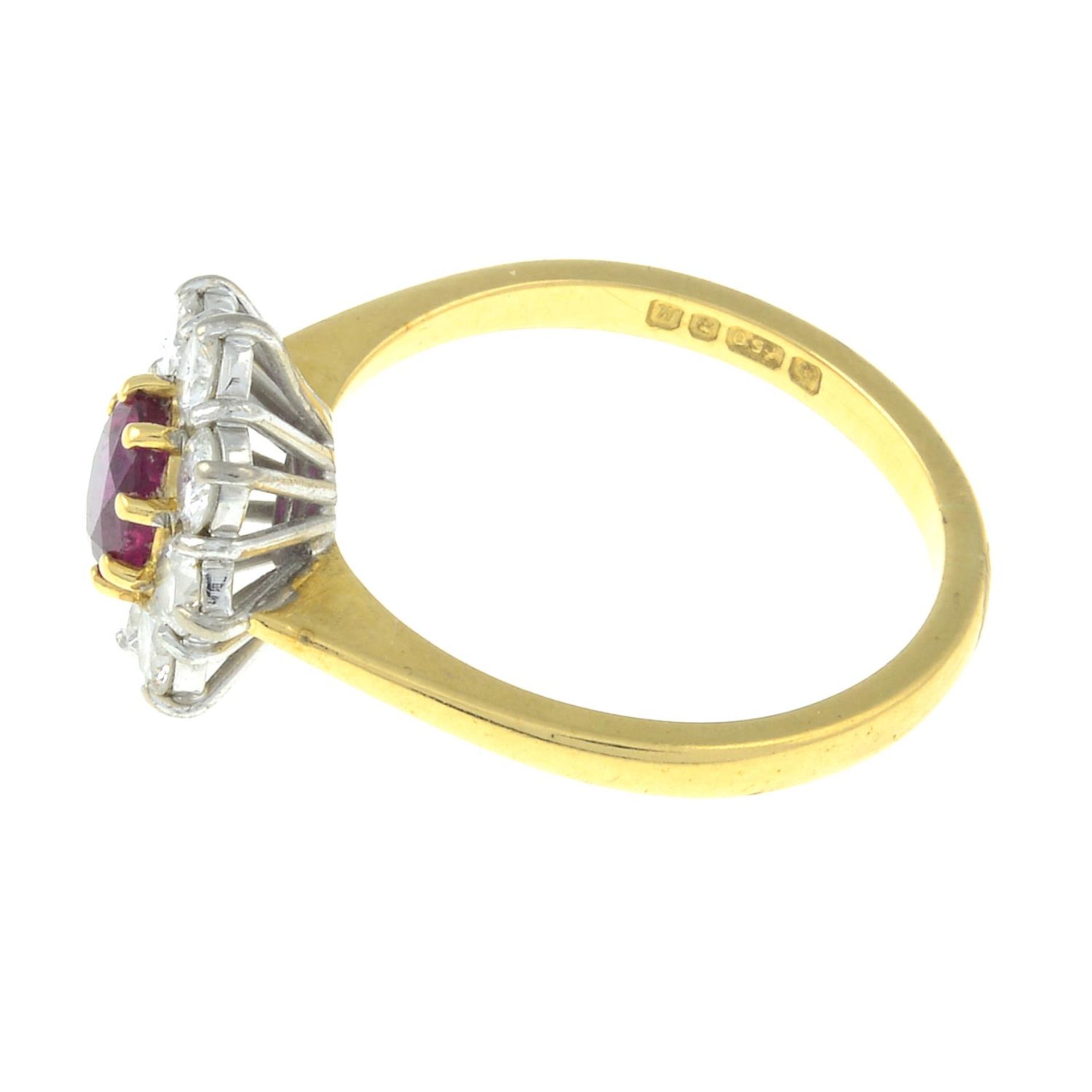 An 18ct gold ruby and brilliant-cut diamond cluster ring.Ruby calculated weight 0.61ct, - Image 2 of 3