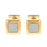 A pair of pave-set diamond square-shape cufflinks.Total diamond weight 0.48ct, stamped to mount.
