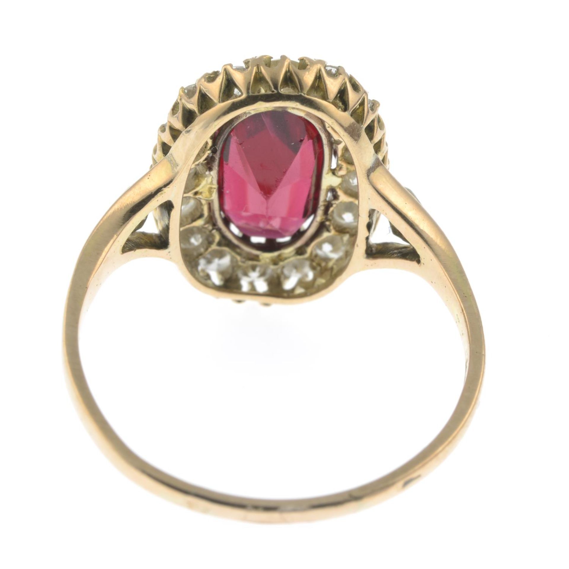 A red spinel and brilliant-cut diamond cluster ring. - Image 3 of 4