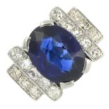 A mid 20th century synthetic sapphire and brilliant-cut diamond dress ring.Estimated total diamond