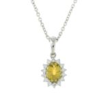 A citrine and brilliant-cut diamond pendant,