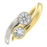 An 18ct gold brilliant-cut diamond two-stone ring.Estimated total diamond weight 0.50ct,