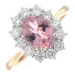 An 18ct gold pink tourmaline and brilliant-cut diamond cluster ring.Tourmaline weight