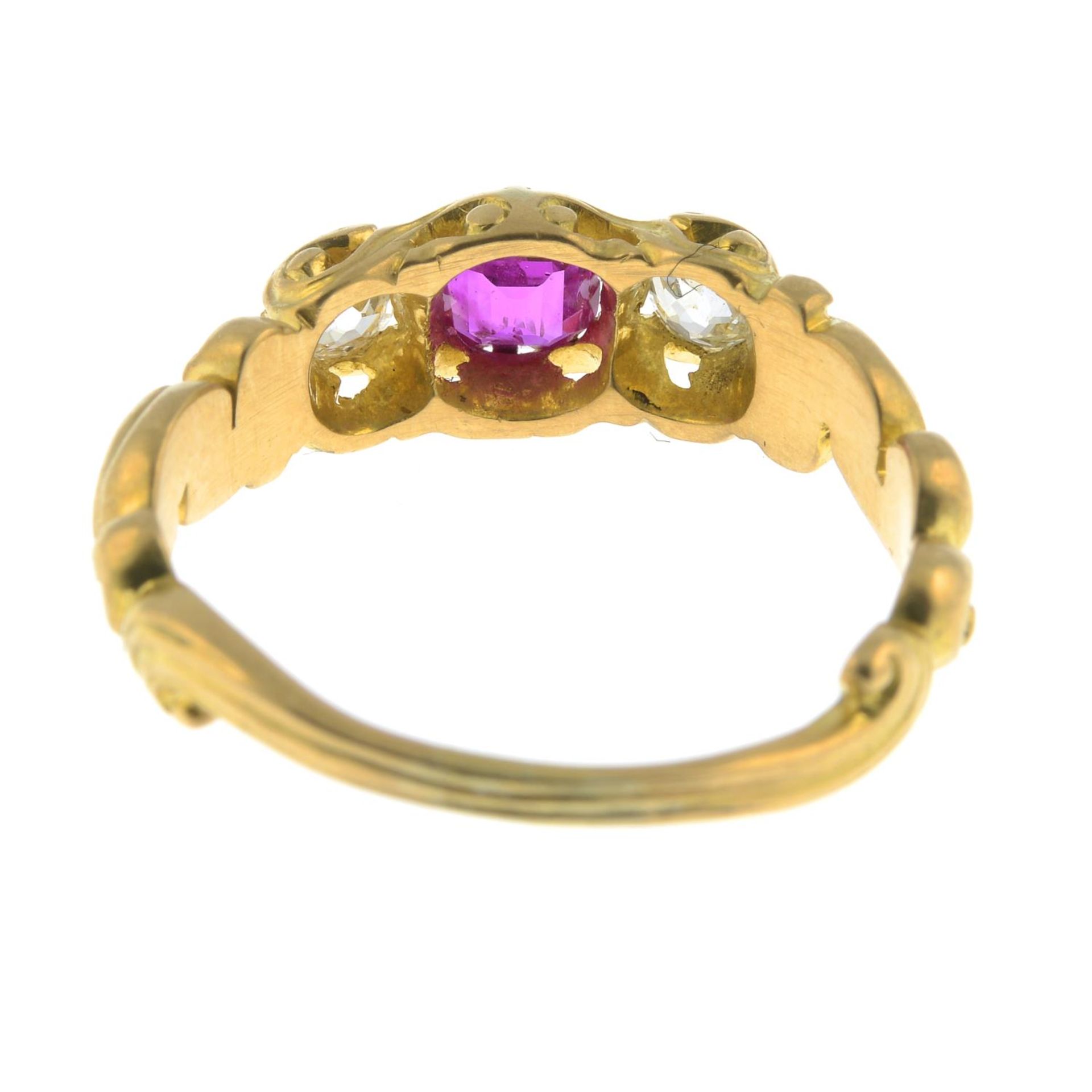 A ruby and old-cut diamond three-stone ring.Ruby weight 0.39ct.Total diamond weight 0.30ct, - Image 2 of 3