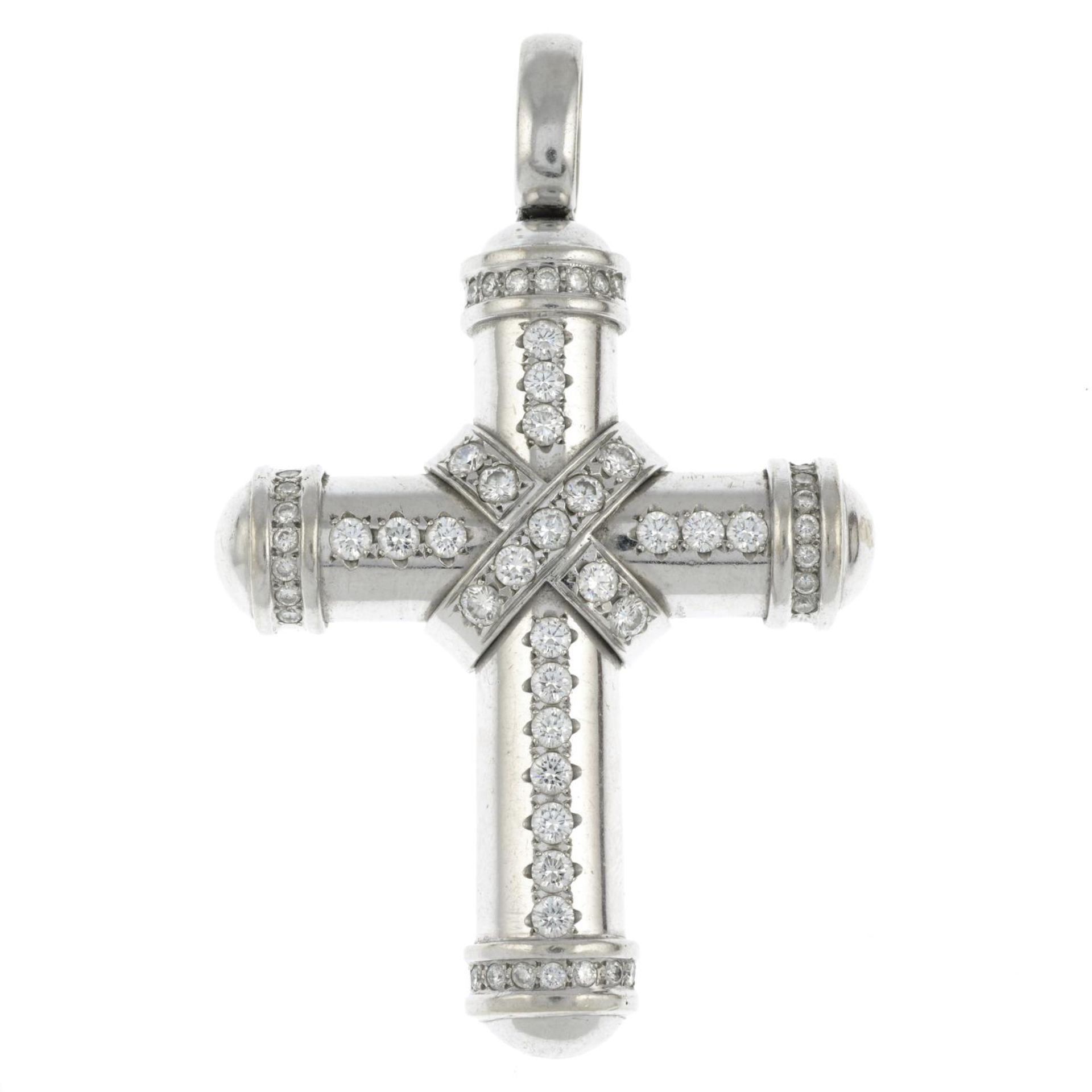 A brilliant-cut diamond cross pendant.