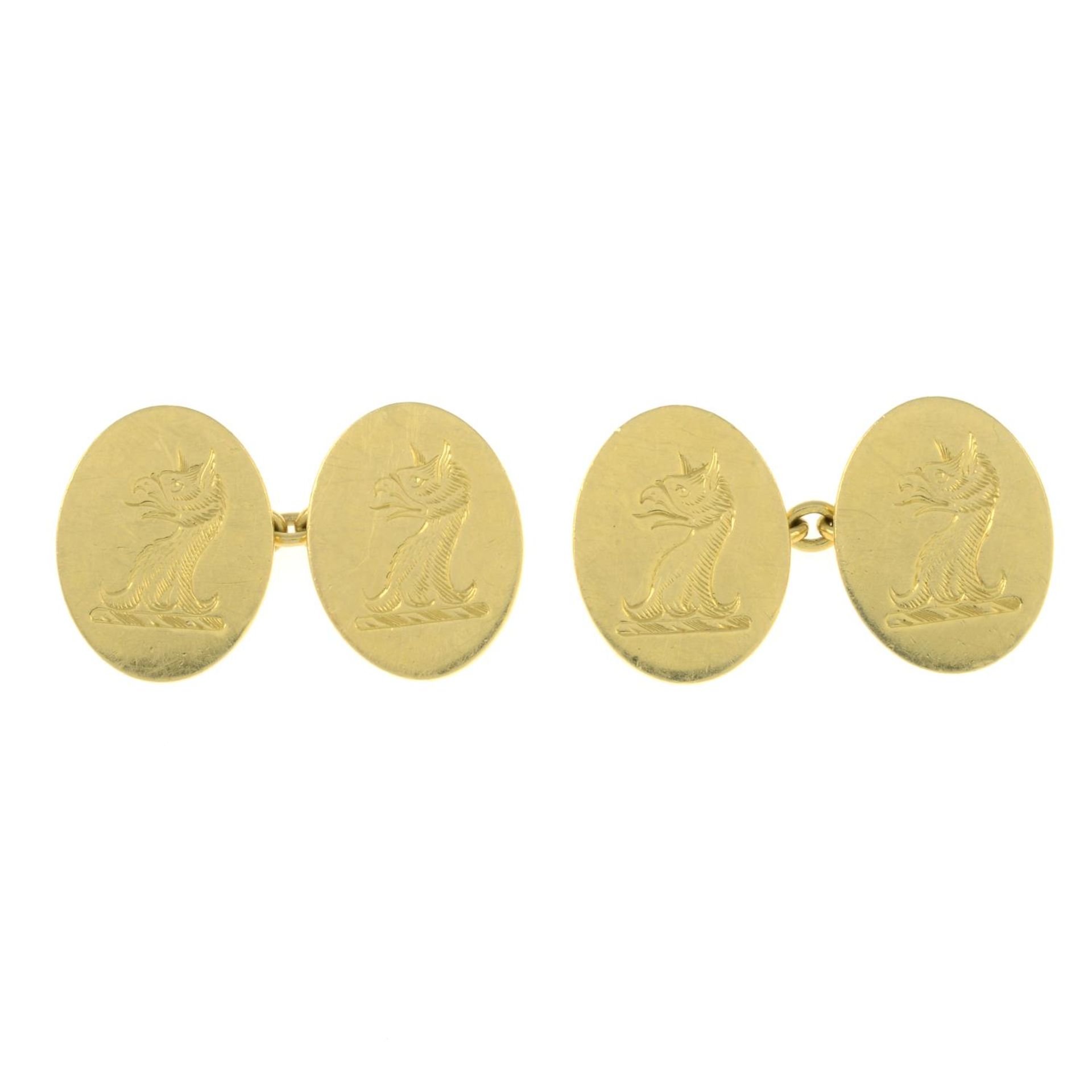 A pair of 18ct gold engraved cufflinks.Hallmarks for London, 2003.Length of cufflink face 1.8cms.