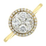 An 18ct gold brilliant-cut diamond cluster ring.Total diamond weight 0.72ct.Hallmarks for