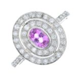 A pink sapphire and brilliant-cut diamond oval cluster ring.Sapphire weight 0.75ct.Total diamond