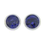 A pair of platinum sapphire single-stone stud earrings,