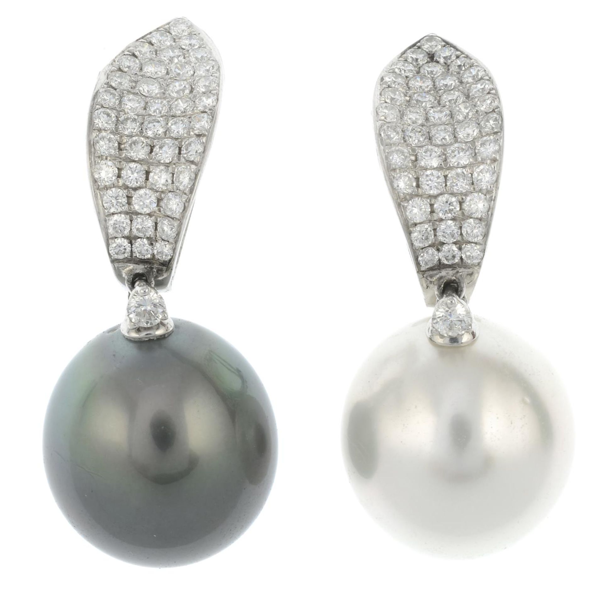 A pair of vari-hue cultured pearl and pave-set diamond earrings.Fittings for non pierced