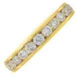 An 18ct gold brilliant-cut diamond half eternity ring.Total diamond weight 1ct,