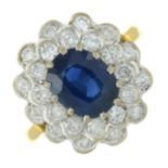 An 18ct gold sapphire and brilliant-cut diamond double cluster ring.Sapphire weight 3cts.Estimated