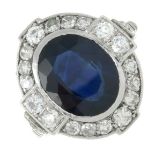 A sapphire and diamond oval cluster ring.Sapphire calculated weight 4.17cts,