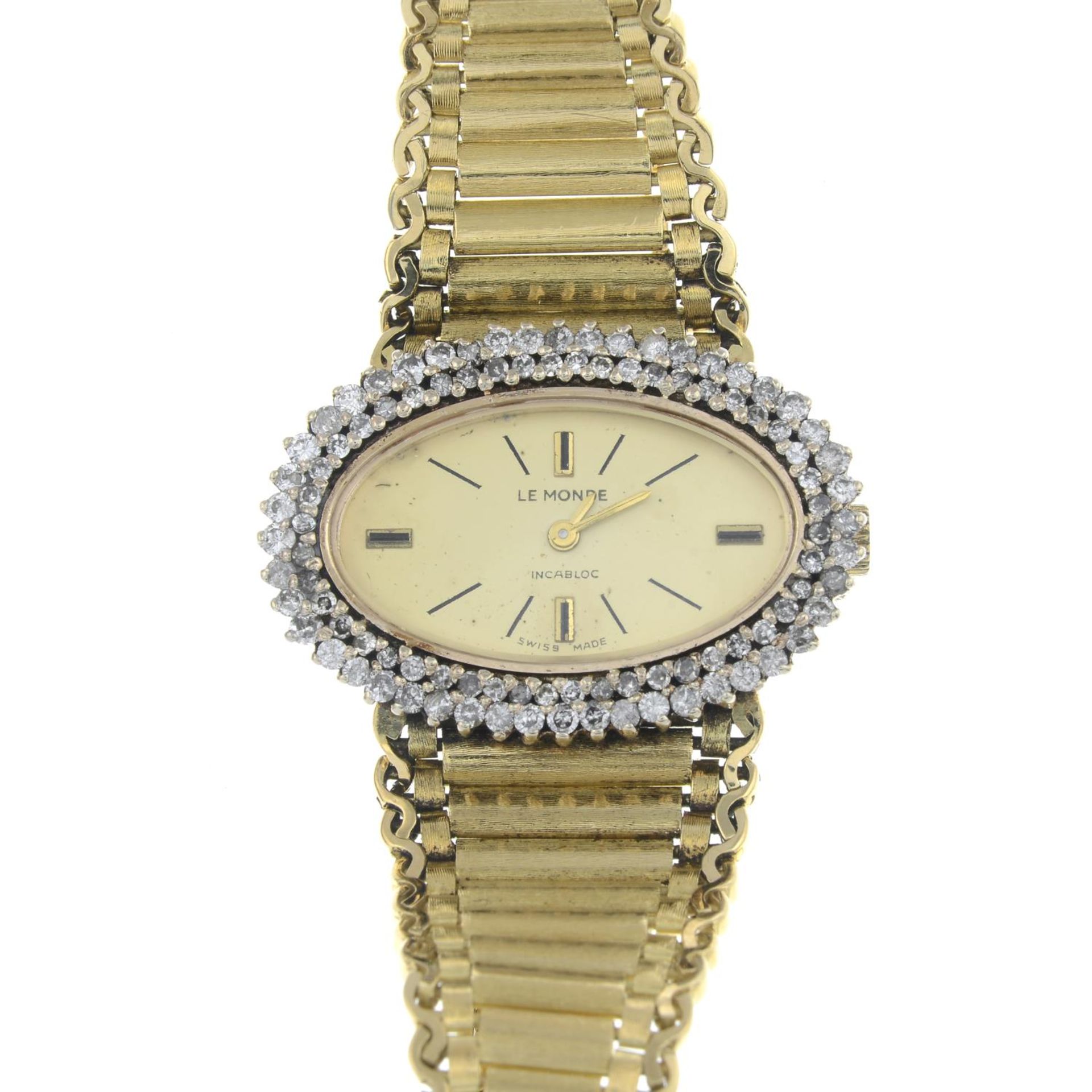 A 1970s 18ct gold brilliant-cut diamond cocktail watch.Estimated total diamond weight