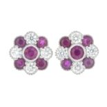 A pair of 18ct gold ruby and brilliant-cut diamond cluster earrings.Total ruby weight 1.72cts.Total