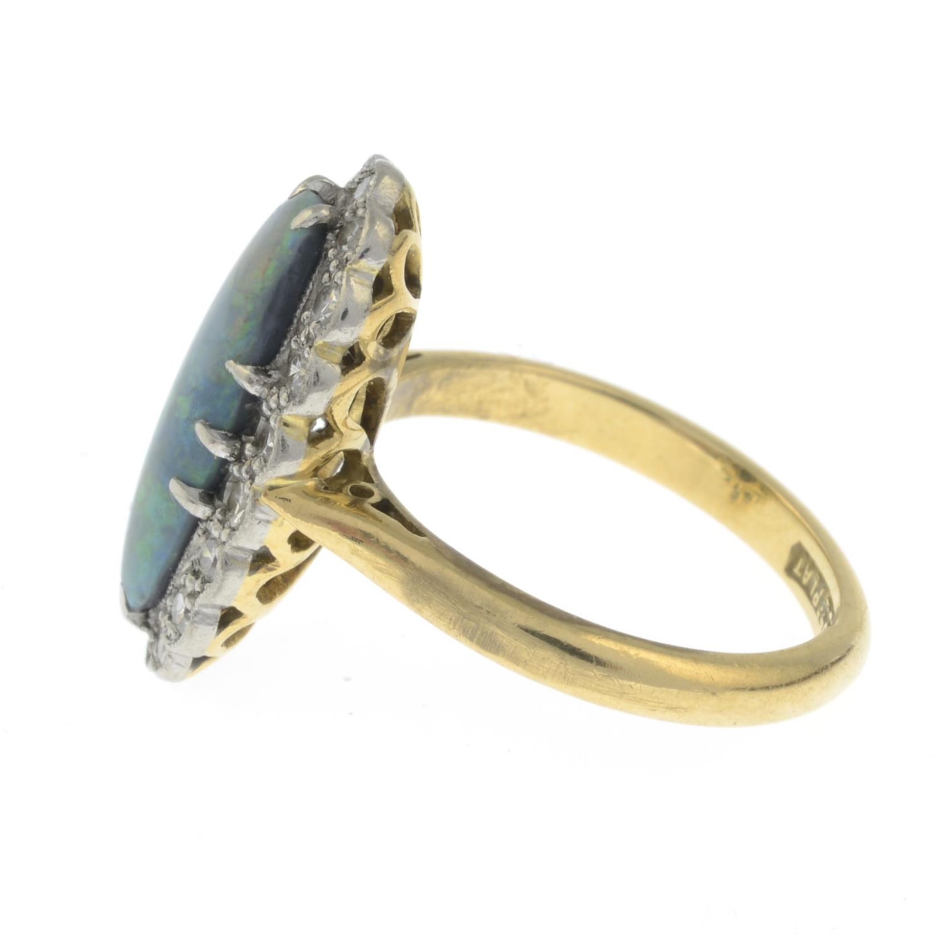 An early 20th century 18ct gold and platinum opal cabochon and single-cut diamond cluster ring. - Image 3 of 3