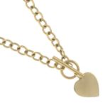 A trace-link necklace, with T-bar clasp, suspending a heart-shape pendant.
