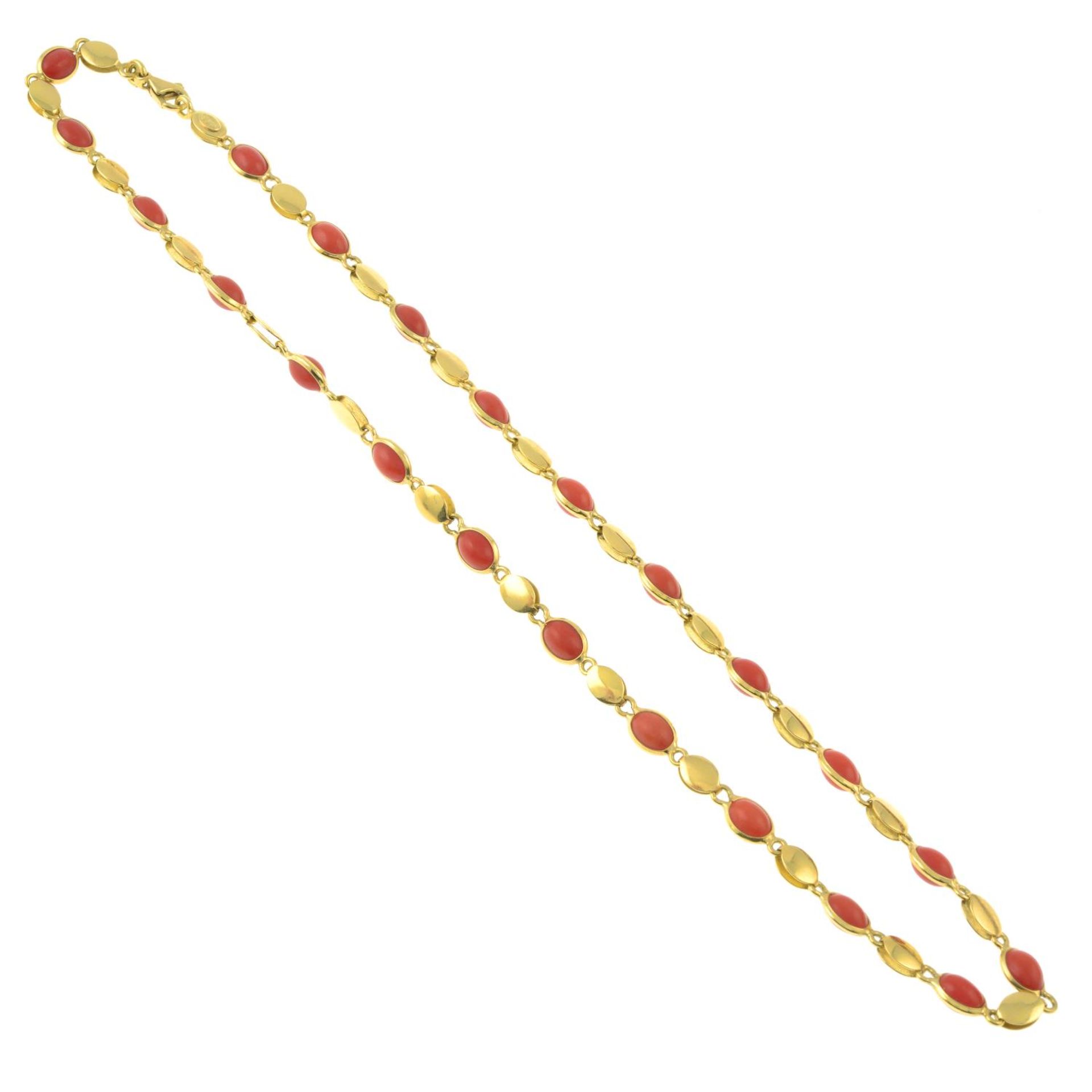 An 18ct gold coral cabochon necklace.Import marks for Sheffield.Length 41cms. - Image 2 of 3