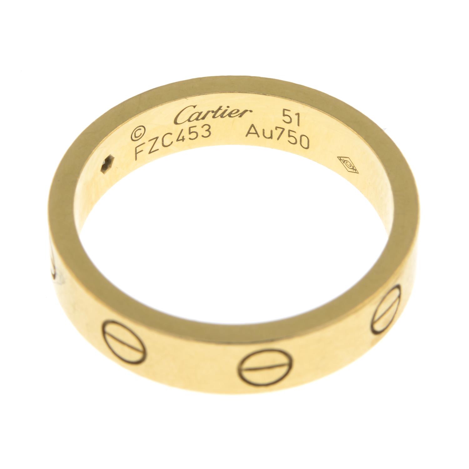 CARTIER - an 18ct gold diamond 'Love' ring. - Image 2 of 3