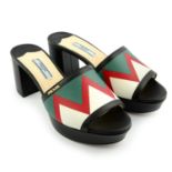 PRADA - a pair of multicoloured leather mules.