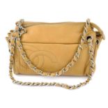 CHANEL - a tan leather Accordion handbag.