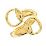 GUCCI - an 18ct gold 'Horsebit' crossover ring.