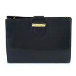 SALVATORE FERRAGAMO - a black leather handbag.