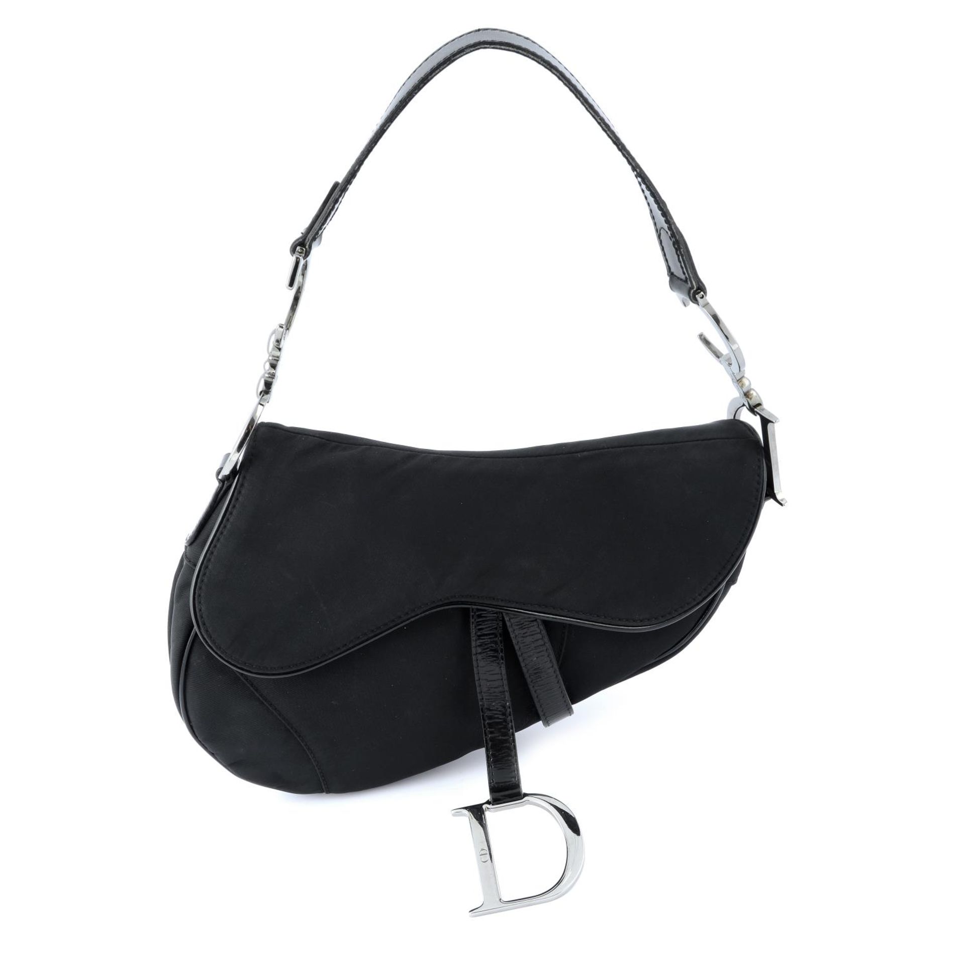 CHRISTIAN DIOR - a black nylon saddle handbag.