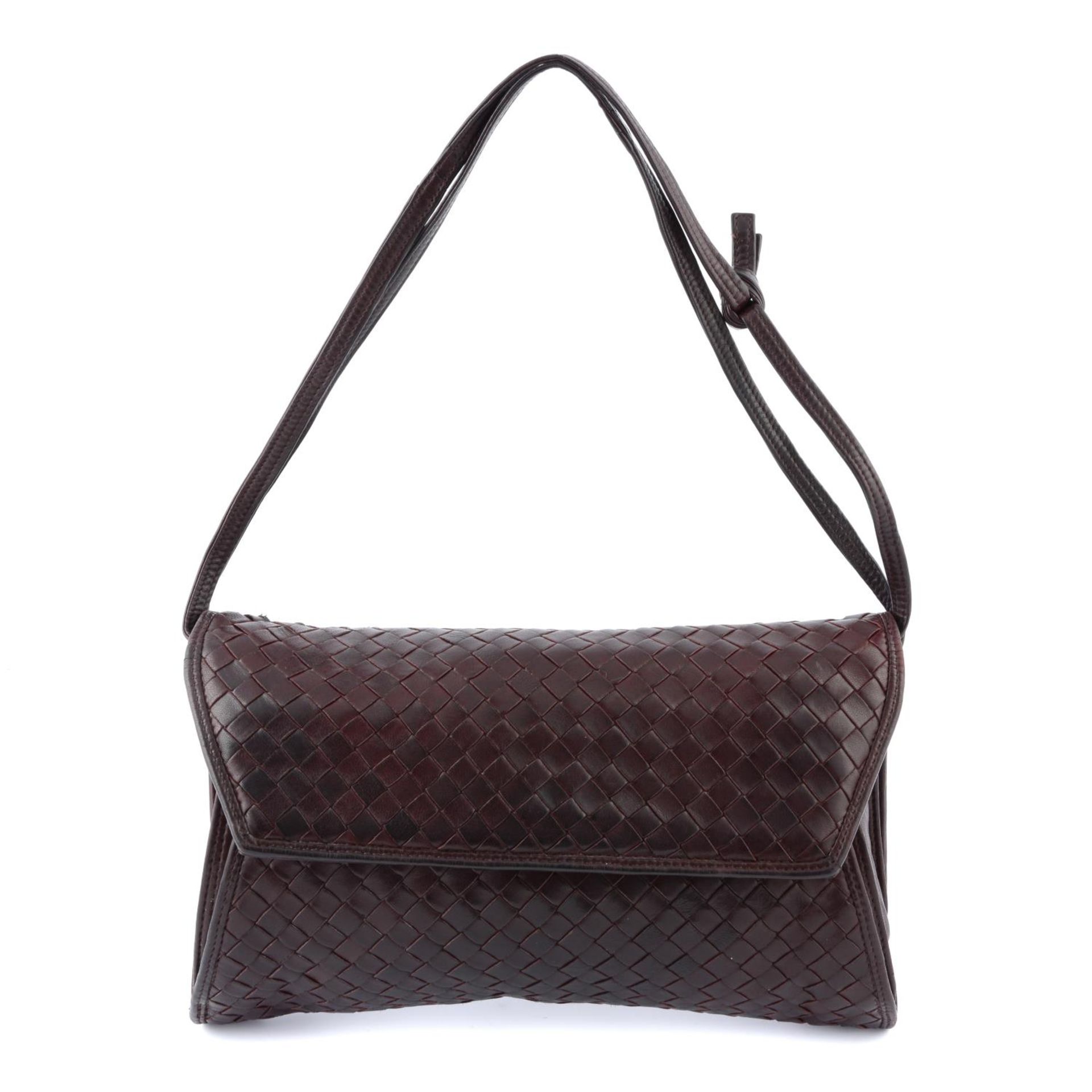 BOTTEGA VENETA - a woven fold-over crossbody handbag.