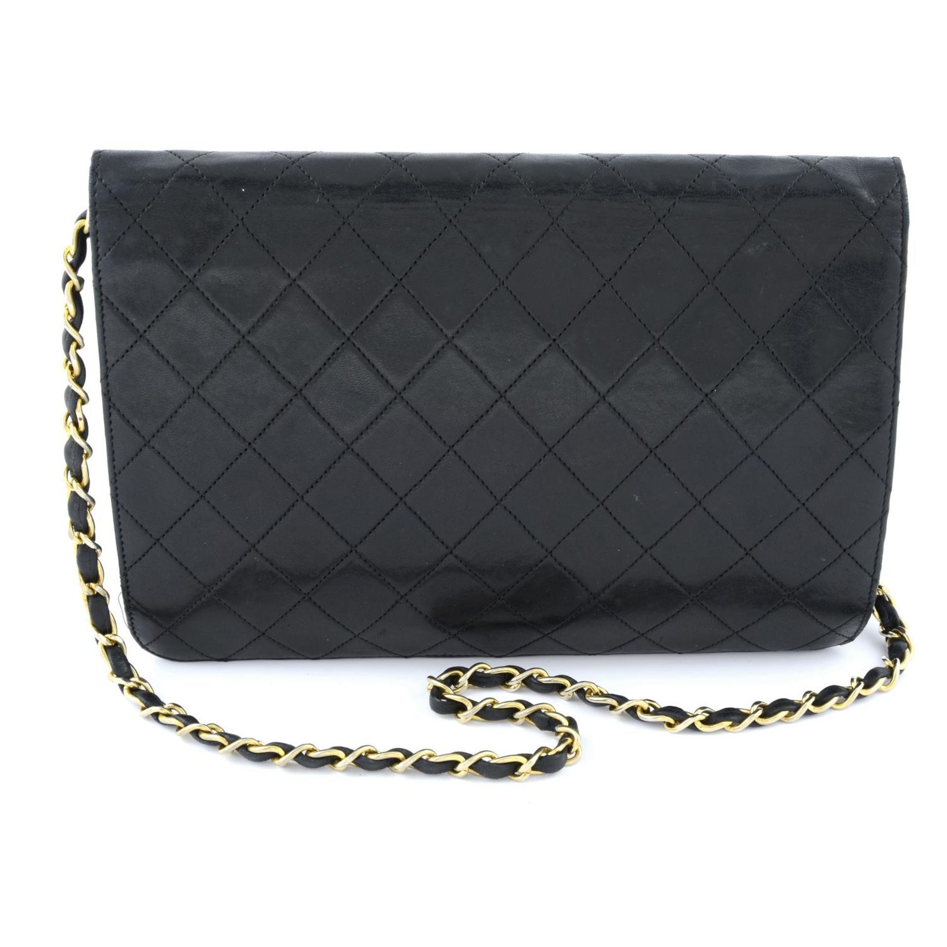 CHANEL - a vintage black single flap handbag. - Bild 2 aus 5