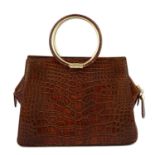 CHRISTIAN DIOR - a vintage brown crocodile skin handbag.