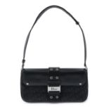 CHRISTIAN DIOR - a black baguette handbag.