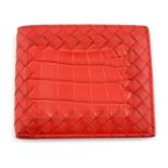 BOTTEGA VENETA - an Intrecciato leather bifold wallet.