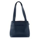 CHANEL - a CC caviar leather zip handbag.