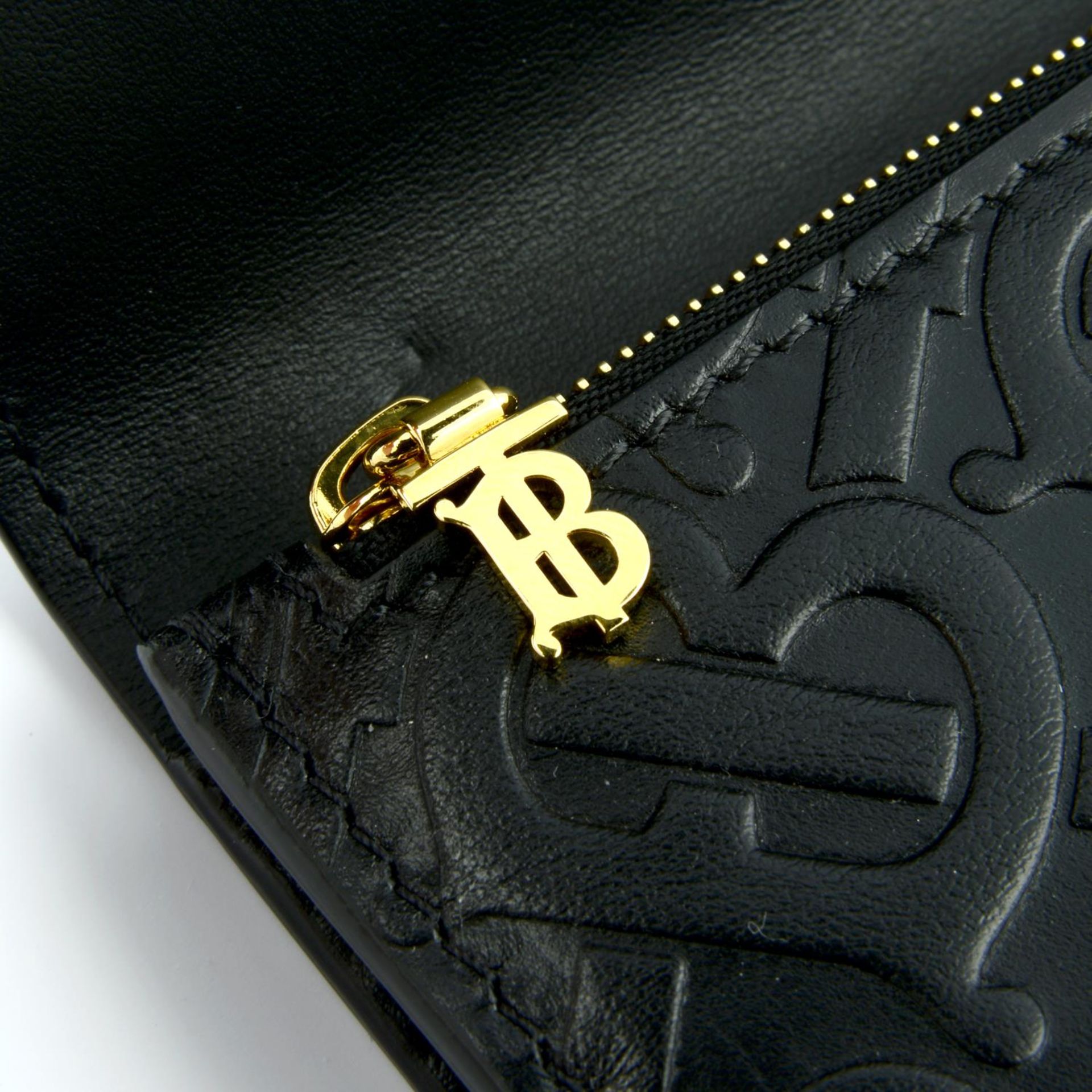 BURBERRY - a black leather monogram continental wallet. - Image 4 of 4