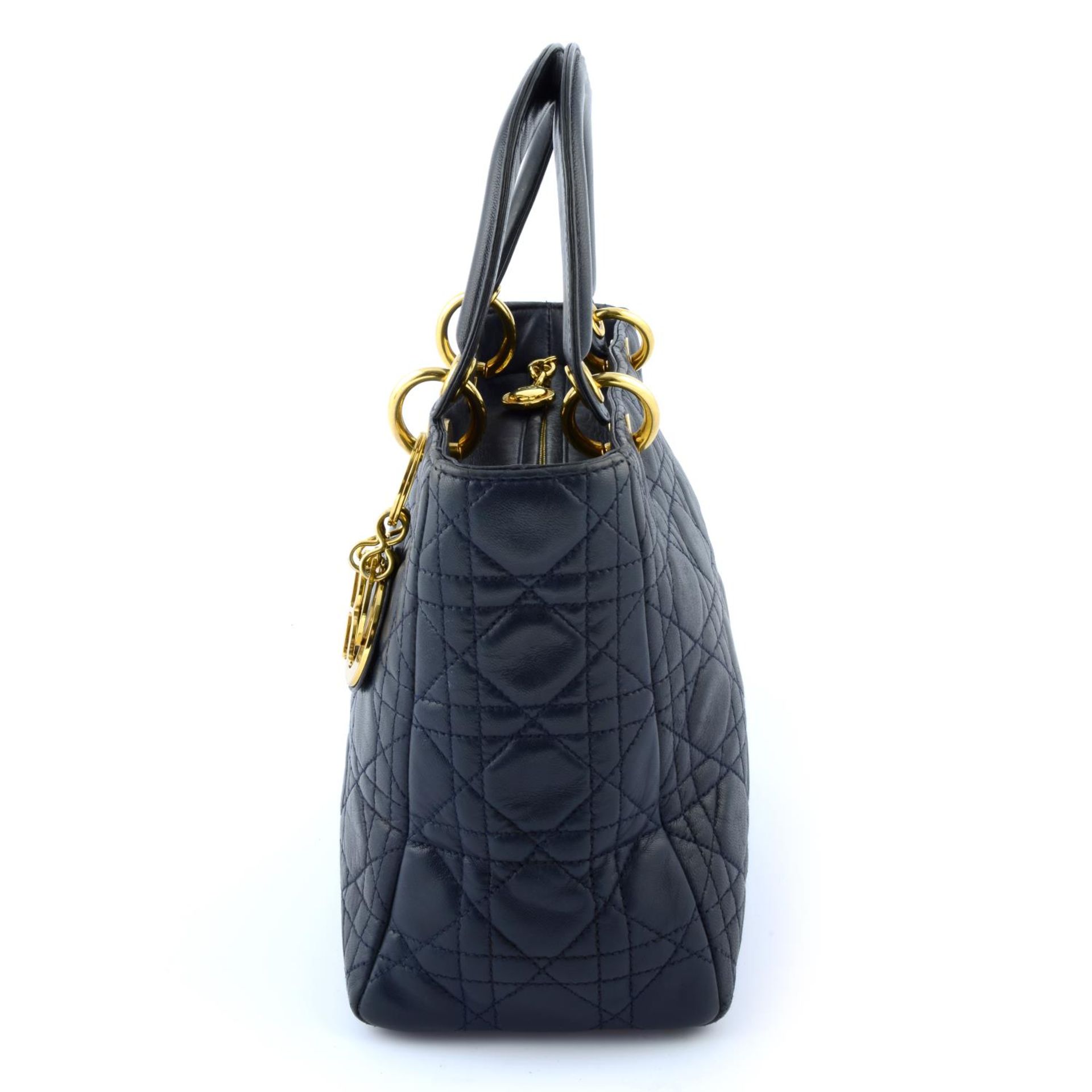 CHRSITIAN DIOR - a navy leather soft body Lady Dior handbag. - Image 3 of 5