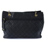 CHANEL - a quilted tote handbag.