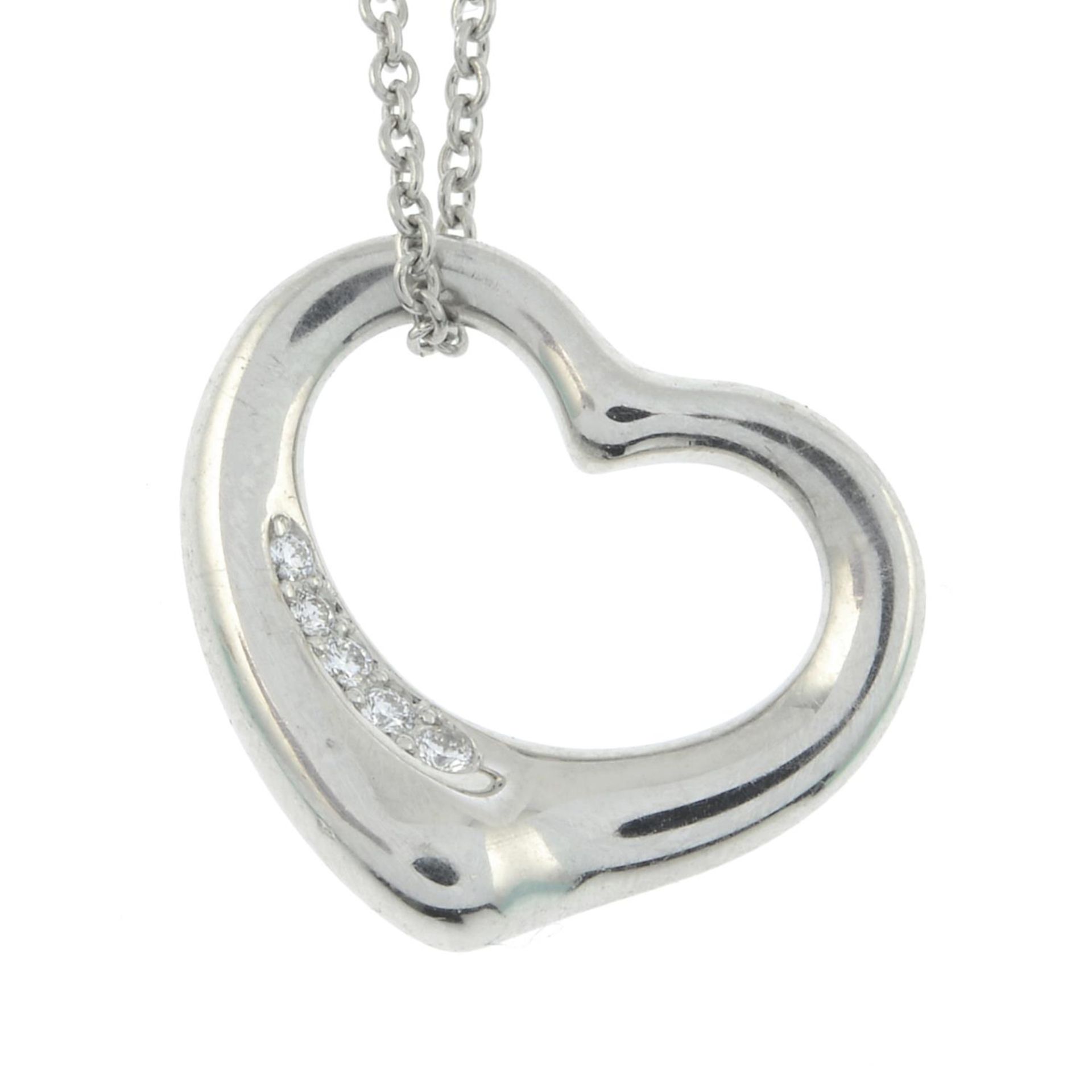 TIFFANY & CO. - an 'Open Heart' pendant with chain.