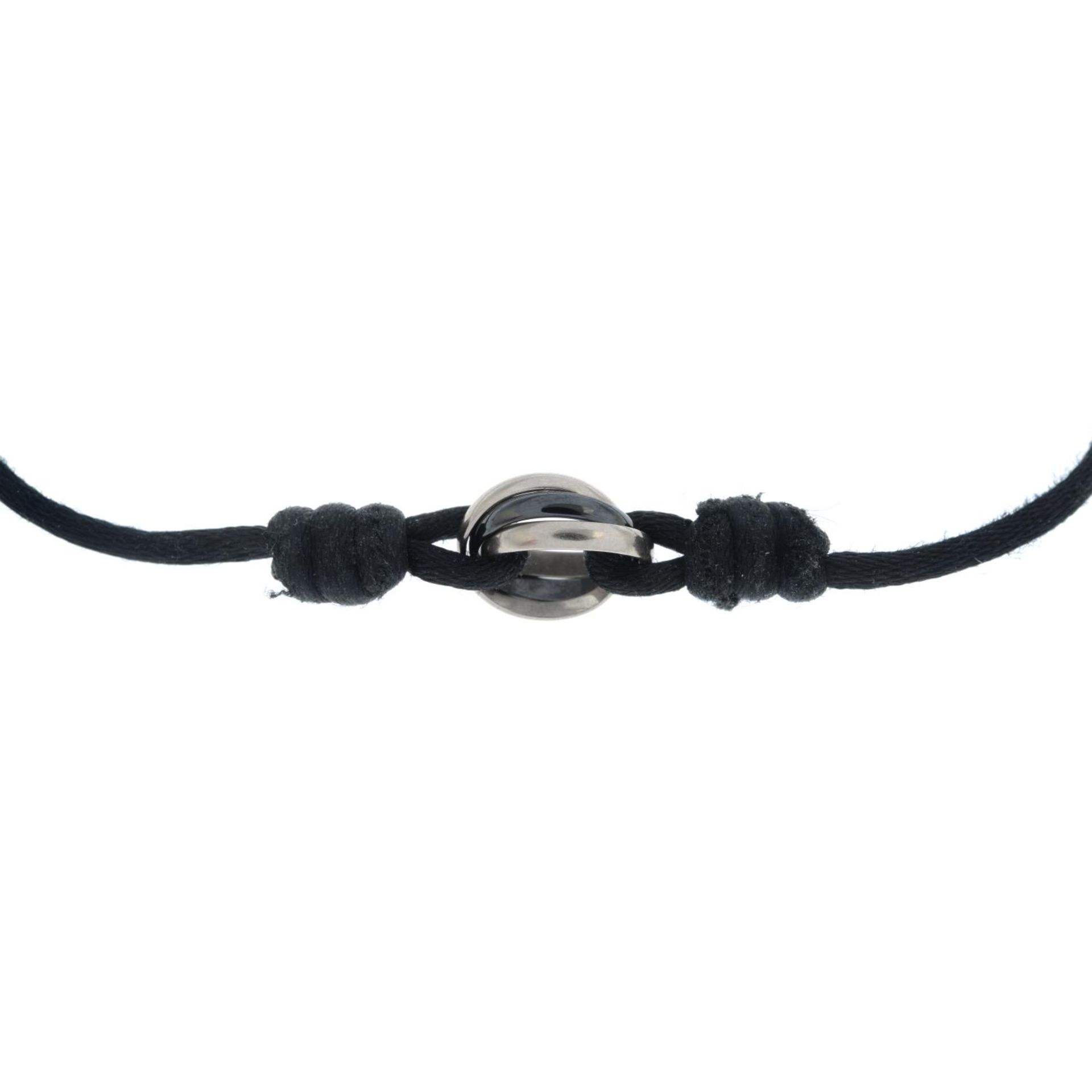 CARTIER - a cord 'Trinity' bracelet. - Image 2 of 3