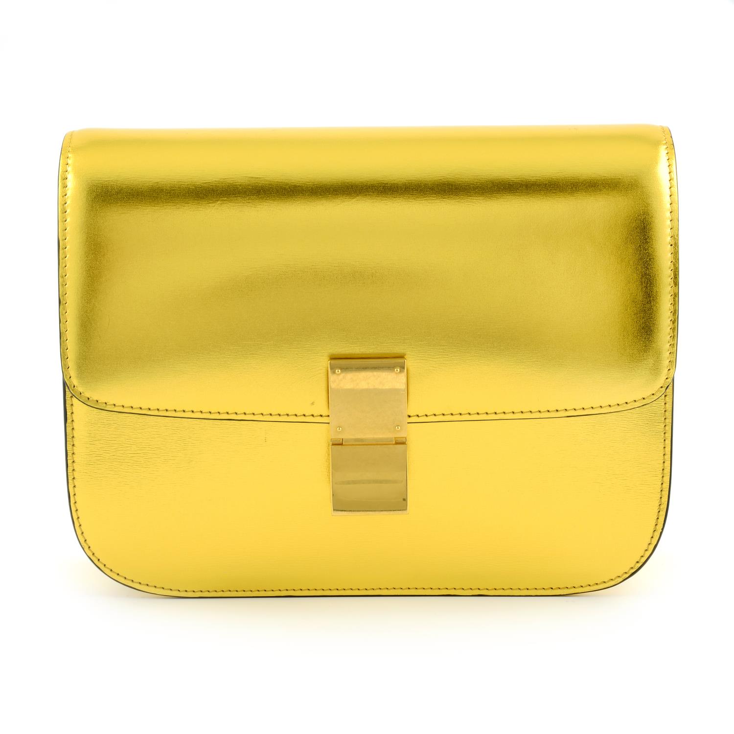 CÉLINE - a metallic gold Box handbag.